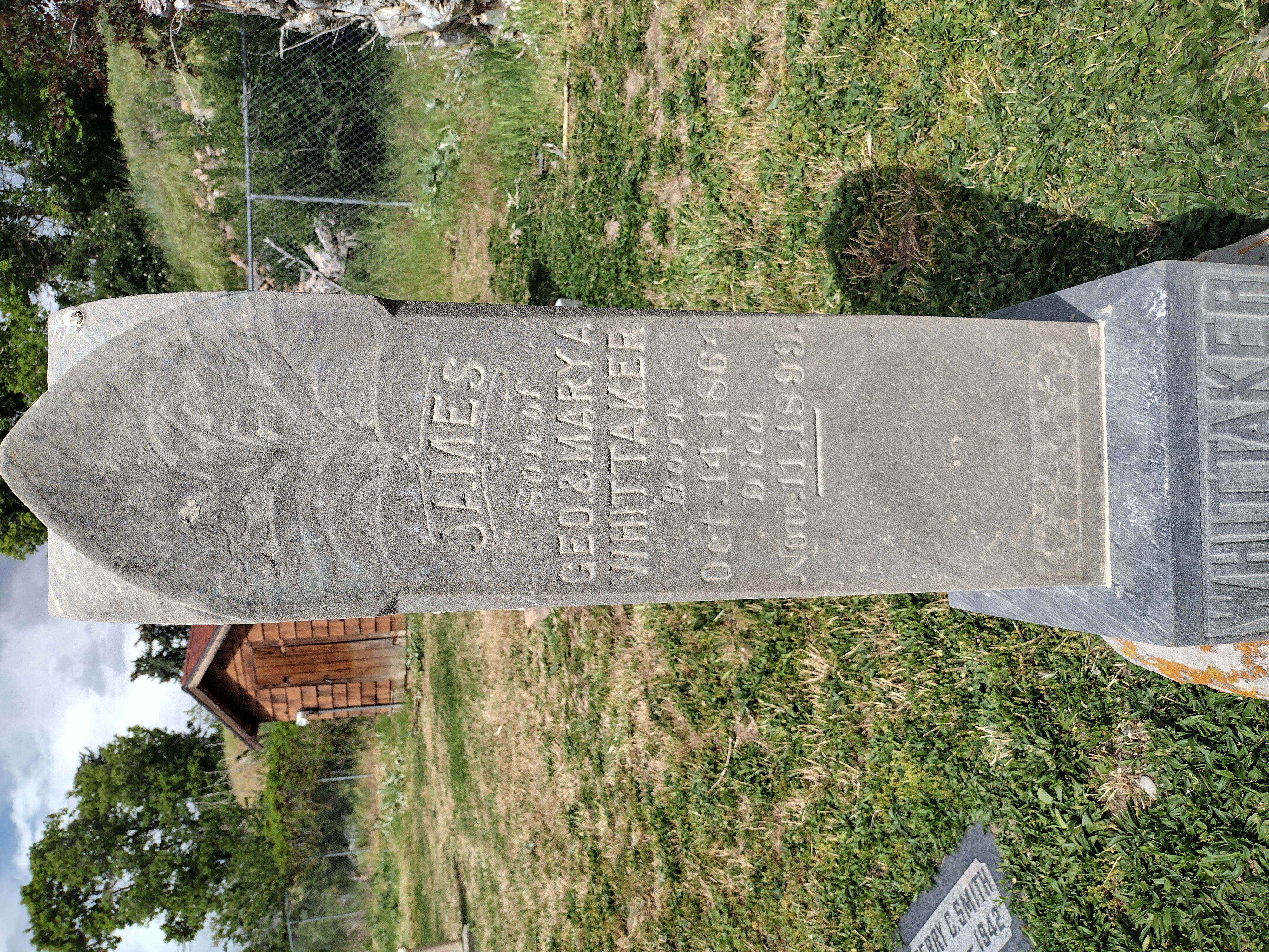 The James Whittaker side of a two-sided gravestone in Mt. Olivet Cemetery